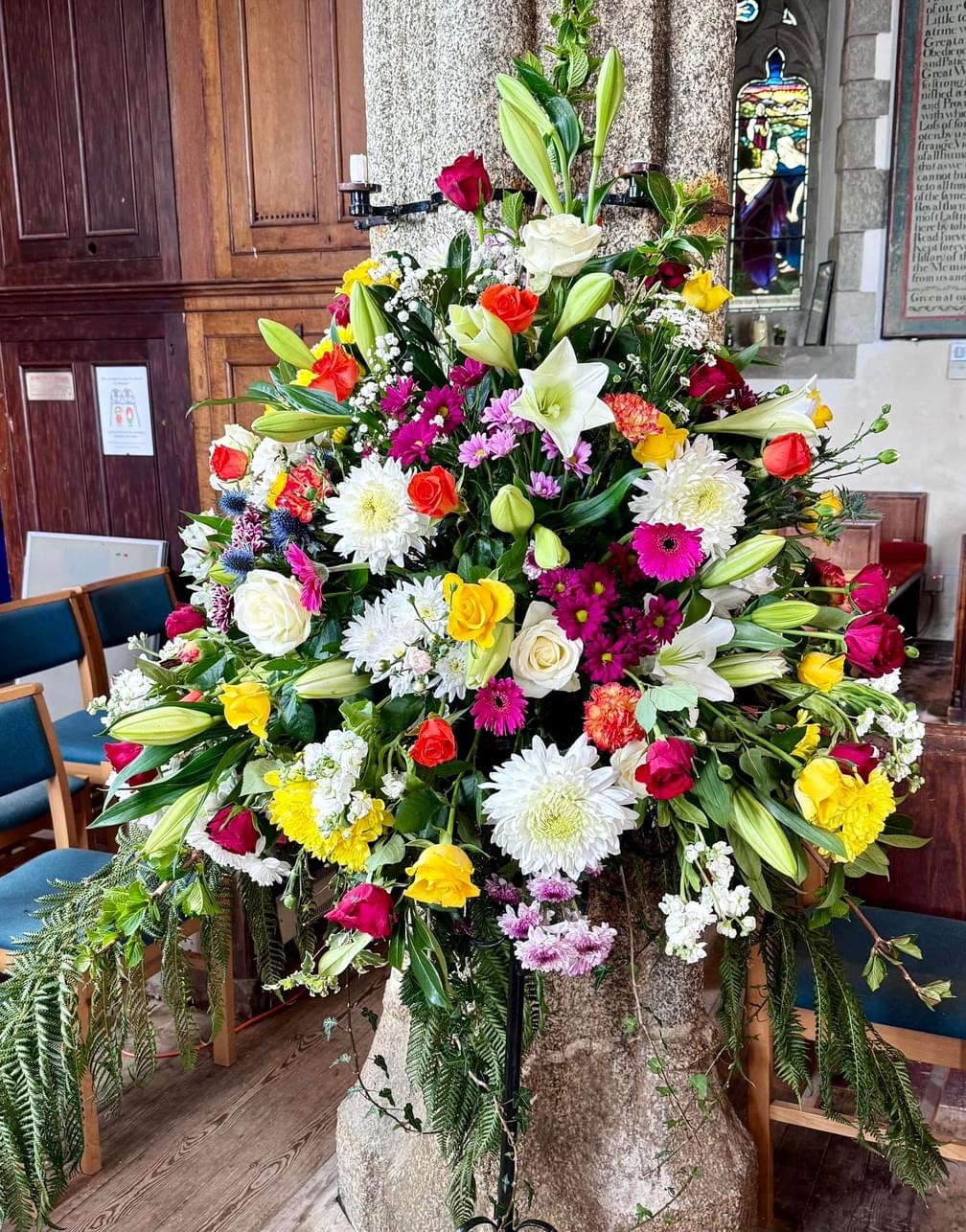 Flower display St Winnow Church Easter Cornwall